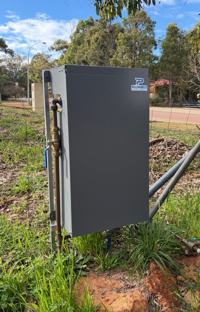 Whole-home filtration system installed on a boundary fence